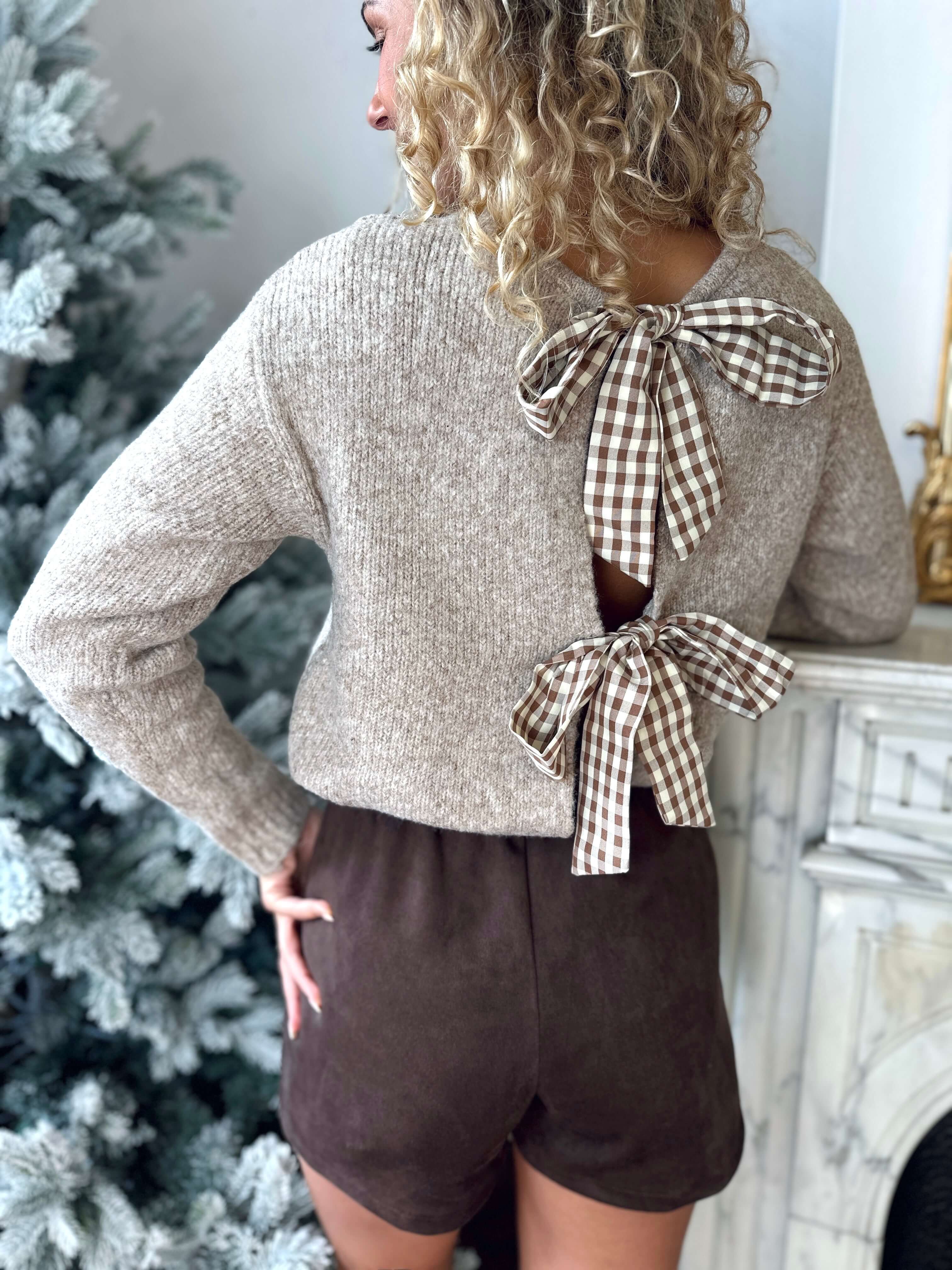 Pull à noeud dans le dos - EMMA